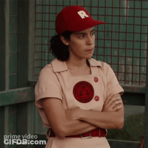 Woman In Red Hat With R Standing Crossed Arms GIF
