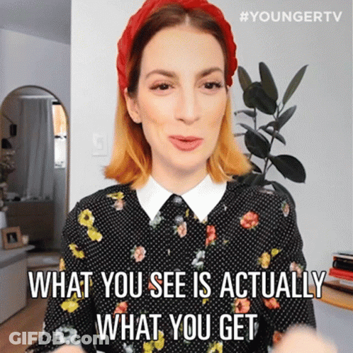 A Woman Wearing A Red Headband And A Polka Dot Shirt Says What You See Is Actually What You Get GIF