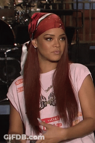 A Woman Wearing A Red Headband And A Vacant Shirt GIF