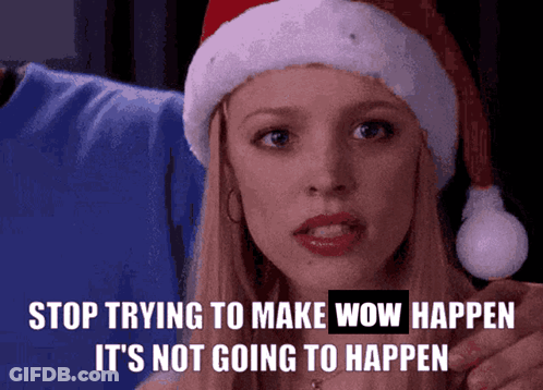 A Woman Wearing A Santa Hat Says Stop Trying To Make Wow Happen GIF
