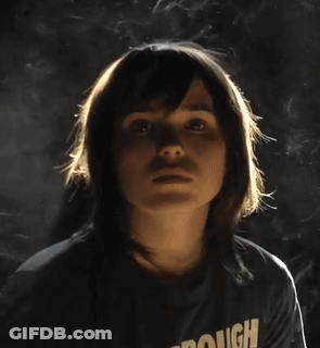 A Woman Wearing A Scarborough Police T-Shirt Smiles GIF