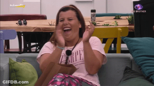 A Woman Wearing A Shirt That Says Carpe Is Laughing GIF
