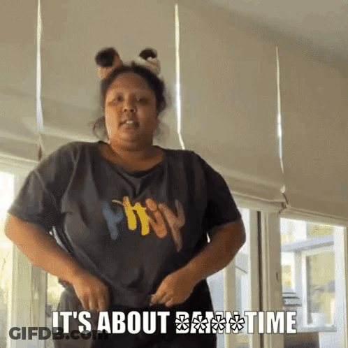 A Woman Wearing A Shirt That Says It 'S About Time GIF
