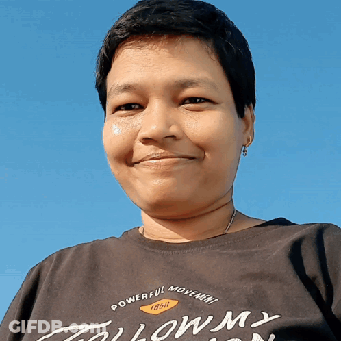 A Woman Wearing A Shirt That Says Powerful Movement 1850 GIF