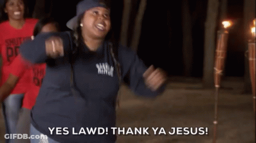 A Woman Wearing A Shirt That Says Shut Up And Pray GIF