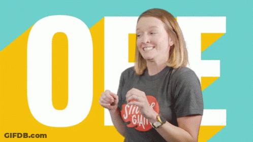 A Woman Wearing A Shirt That Says Sticker Giant On It GIF