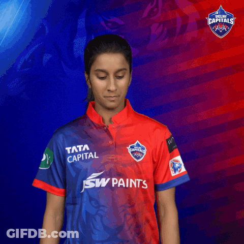 A Woman Wearing A Shirt That Says Tata Capital GIF