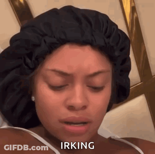 A Woman Wearing A Sleep Cap Is Making A Funny Face And Saying Irving . GIF
