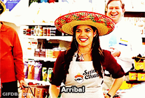 A Woman Wearing A Sombrero And An Apron That Says ' Señor Claus ' GIF