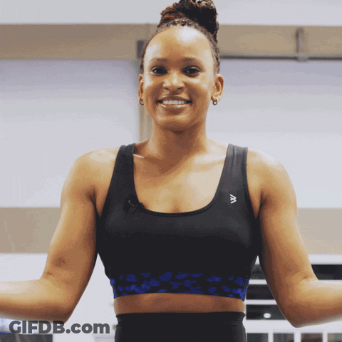 A Woman Wearing A Sports Bra With The Letter A On The Front GIF
