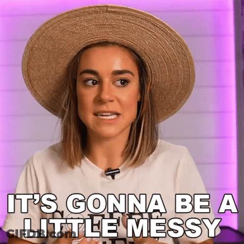 A Woman Wearing A Straw Hat And A White Shirt Says It 'S Gonna Be A Little Messy GIF