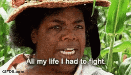 A Woman Wearing A Straw Hat Says All My Life I Had To Fight GIF
