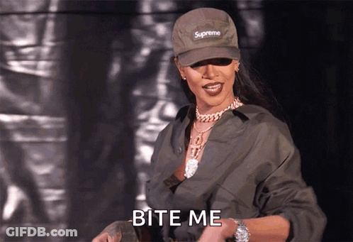 A Woman Wearing A Supreme Hat And A Watch Says Bite Me GIF