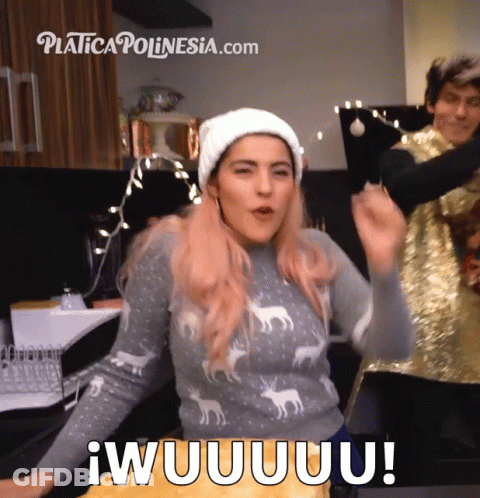A Woman Wearing A Sweater With Deer On It And A White Hat Says Iwuuuuuu GIF