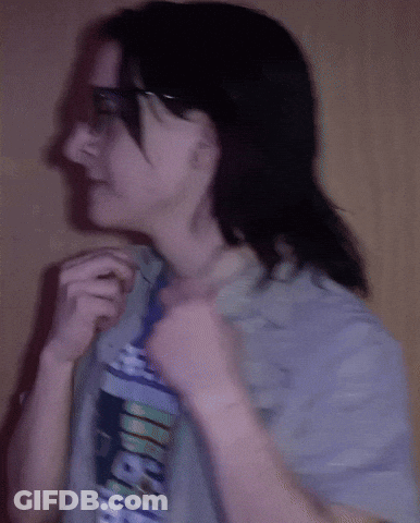 A Woman Wearing A T-Shirt That Says Aeeicf On It GIF