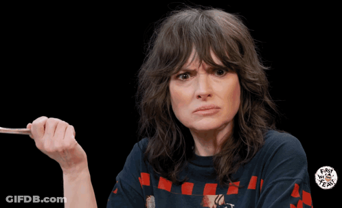 A Woman Wearing A T-Shirt That Says " Easy Tiger " Applauds GIF