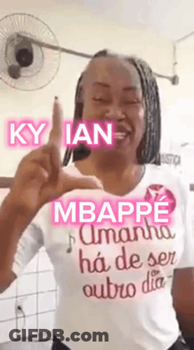 A Woman Wearing A T-Shirt That Says Mbappe On It GIF