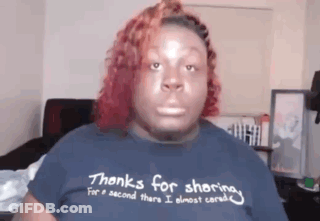 A Woman Wearing A T-Shirt That Says Thanks For Sharing GIF