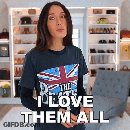 A Woman Wearing A T-Shirt That Says The Beatles I Love Them All GIF