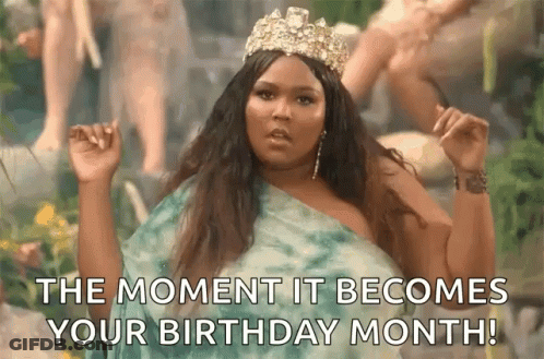 A Woman Wearing A Tiara Is Standing In Front Of A Waterfall And Says The Moment It Becomes Your Birthday Month . GIF