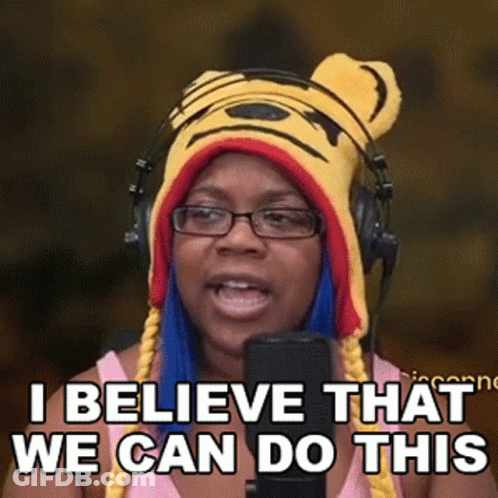 A Woman Wearing A Tiger Hat And Headphones Says I Believe That We Can Do This GIF