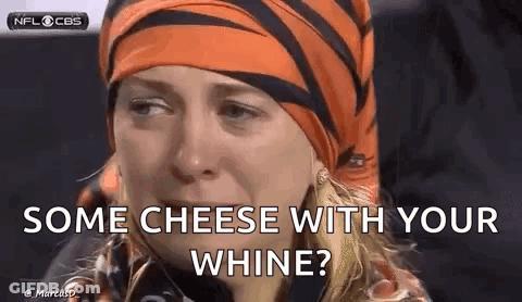 A Woman Wearing A Tigers Headband Is Crying And Asking For Some Cheese With Her Whine . GIF