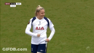 A Woman Wearing A White Aia Jersey Stands On A Field GIF