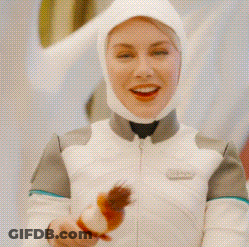 A Woman Wearing A White Helmet And A White Jacket Is Smiling GIF