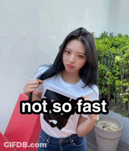 A Woman Wearing A White Shirt That Says Not So Fast On It GIF