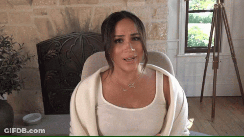 A Woman Wearing A White Tank Top And A Necklace That Says ' I Love You ' On It GIF