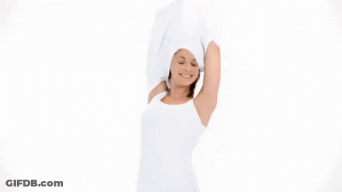A Woman Wearing A White Tank Top Has 48H Protection Written On Her Underarm GIF