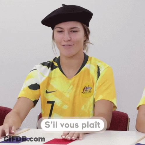 A Woman Wearing A Yellow Jersey With The Number 7 GIF