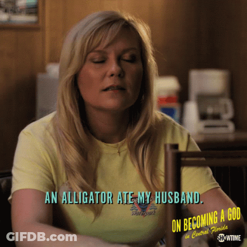 A Woman Wearing A Yellow Shirt That Says " An Alligator Ate My Husband " GIF