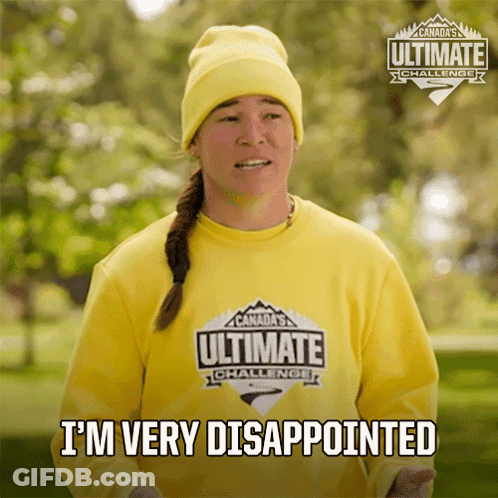A Woman Wearing A Yellow Shirt That Says Canada 'S Ultimate Challenge GIF