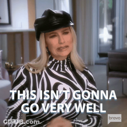 A Woman Wearing A Zebra Print Top And A Black Hat Says This Isn 'T Gonna Go Very Well GIF