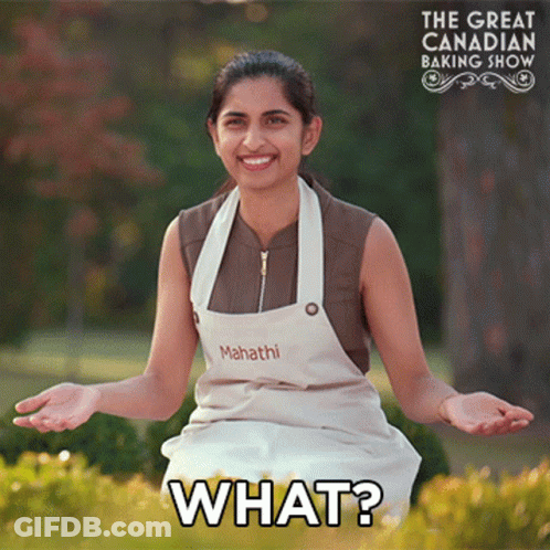 Woman In Apron Asking What GIF