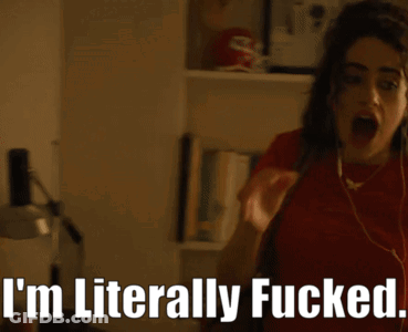 A Woman Wearing Earbuds Says I 'M Literally Fucked GIF