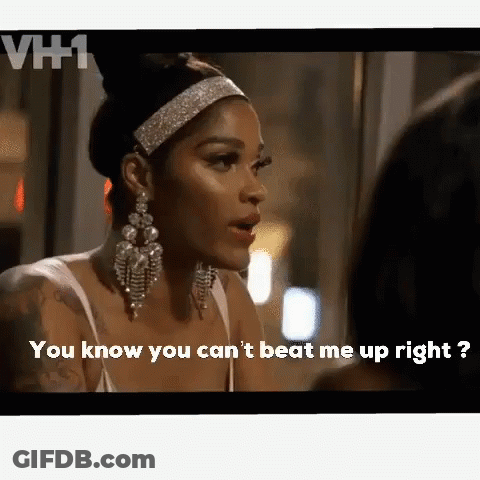 A Woman Wearing Earrings And A Headband Says You Know You Can 'T Beat Me Up Right .. GIF