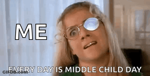 A Woman Wearing Glasses And A Green Shirt Is Making A Funny Face And Saying `` Me Every Day Is Middle Child Day '' . GIF