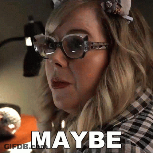 A Woman Wearing Glasses And A Headband Says Maybe GIF
