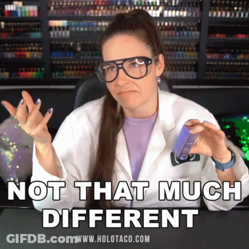 A Woman Wearing Glasses And A Lab Coat Says " Not That Much Different " While Holding Something GIF