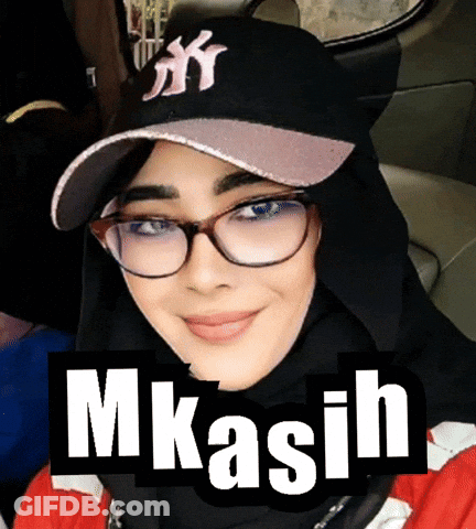 A Woman Wearing Glasses And A Ny Hat With The Word Mkasih On It GIF