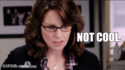 A Woman Wearing Glasses And A Plaid Shirt Says " Not Cool " On A Screen GIF
