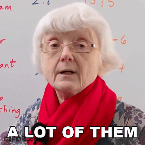 A Woman Wearing Glasses And A Red Scarf Says A Lot Of Them GIF