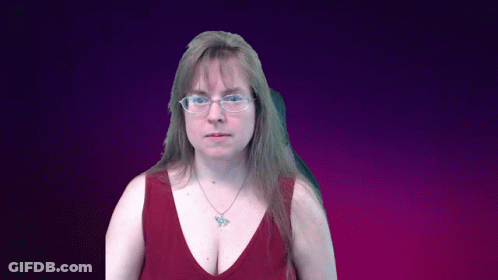 A Woman Wearing Glasses And A Red Tank Top With A Butterfly Necklace GIF