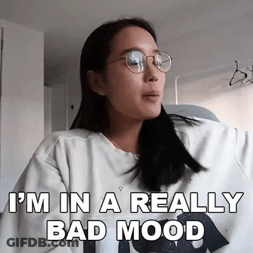 Woman With Glasses Saying I'm In A Bad Mood GIF