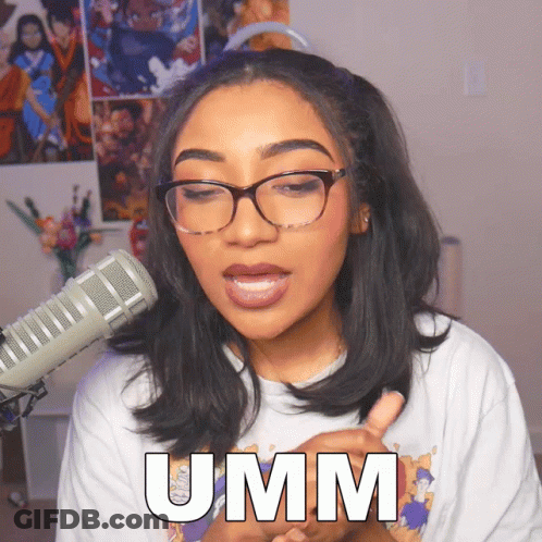 A Woman Wearing Glasses And A White Shirt That Says Umm GIF