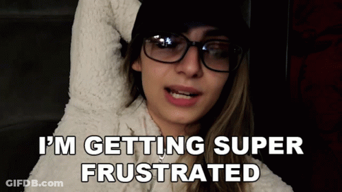 A Woman Wearing Glasses And A White Sweater Says I 'M Getting Super Frustrated GIF