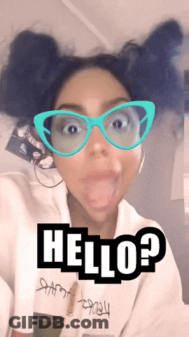 A Woman Wearing Glasses And A White Sweatshirt With The Word Hello On It GIF