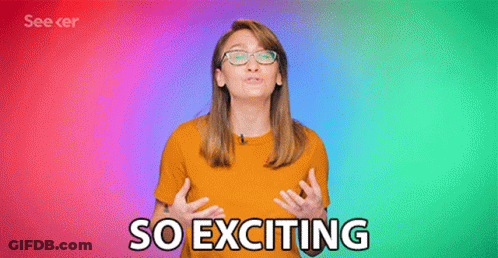 A Woman Wearing Glasses And An Orange Shirt Says " So Exciting " GIF